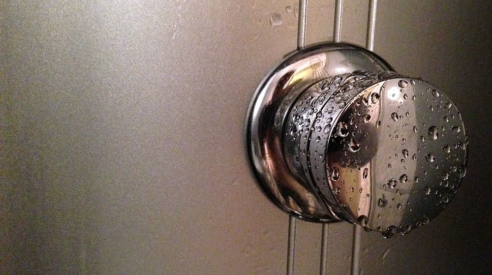 A round knob with water drops on.